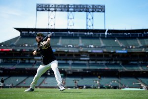 Reliever warms up on field