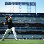 Reliever warms up on field